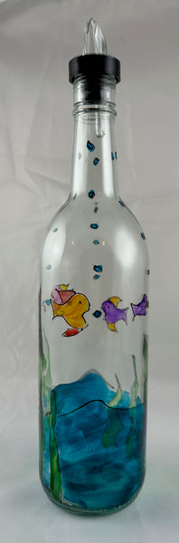 Hand painted aqua water and colorful fish glass bottle