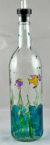 Hand painted aqua water and colorful fish glass bottle