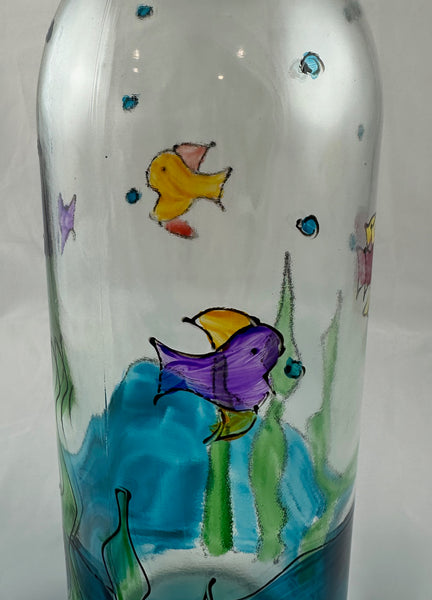 Hand painted aqua water and colorful fish glass bottle