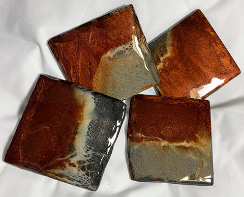 Bronze and gold slate coasters, coated with clear shiny resin