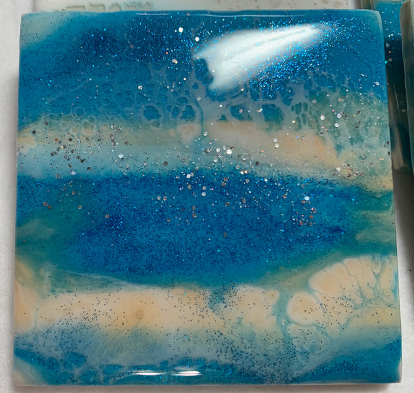 Ocean wave blue, sand and white, sparkly resin, ceramic coasters