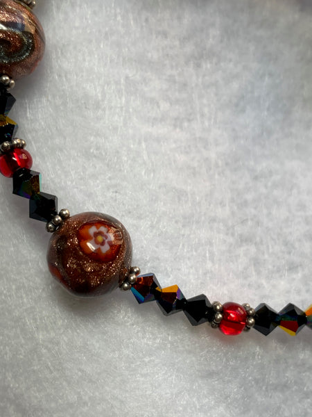 Bronze and red beaded bracelet