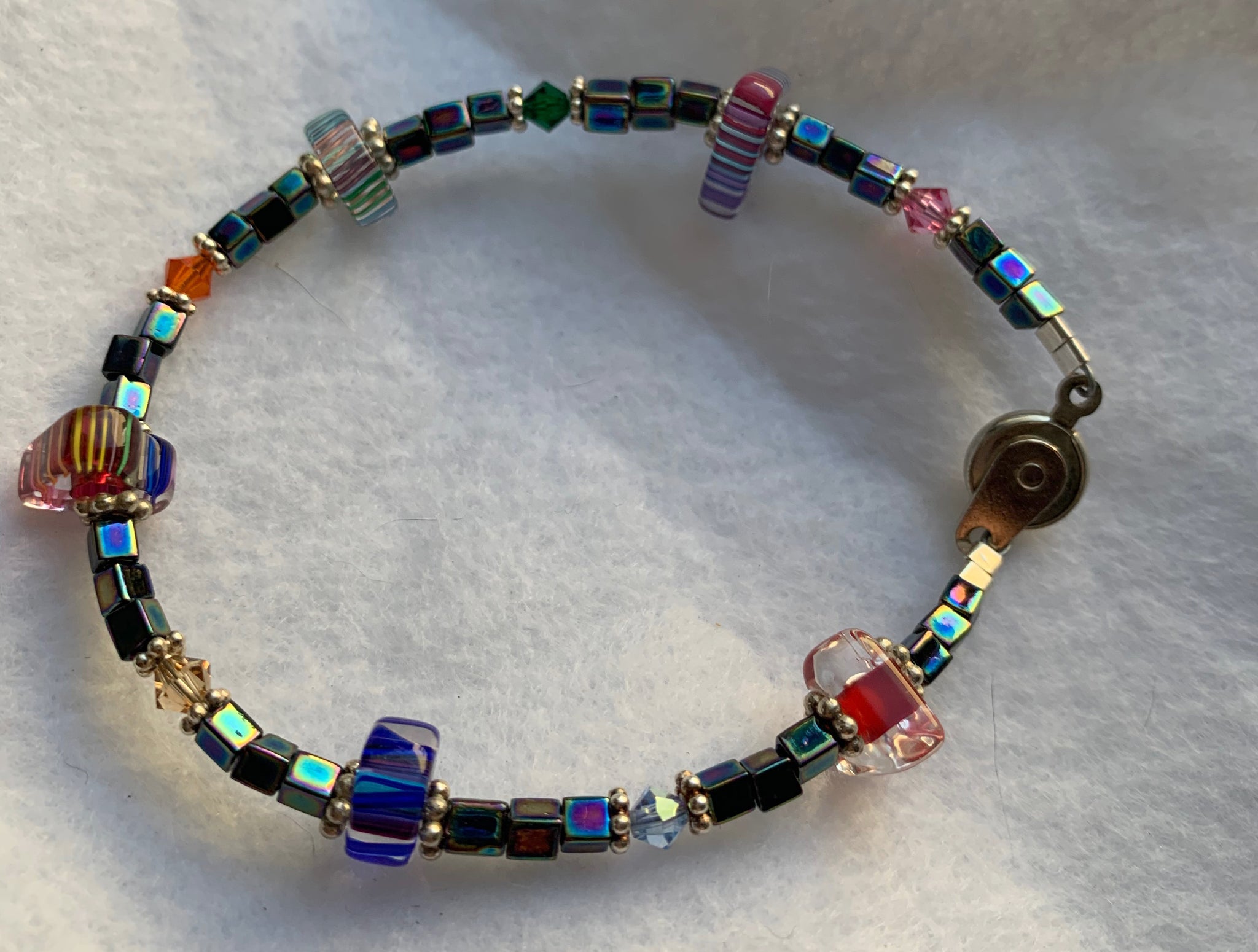 Cane glass bracelet iridescent blue black beads